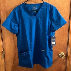 Cherokee scrub top. Size medium. Royal blue